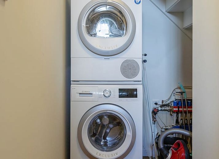 Terrasse von Cottage in Oudeschild, Ferienhaus auf Texel, mit schoener Aussicht auf die Felder.