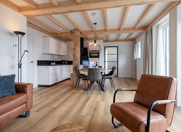 Apartment C in Oudeschild, Texel with charming outdoor space and colorful garden.