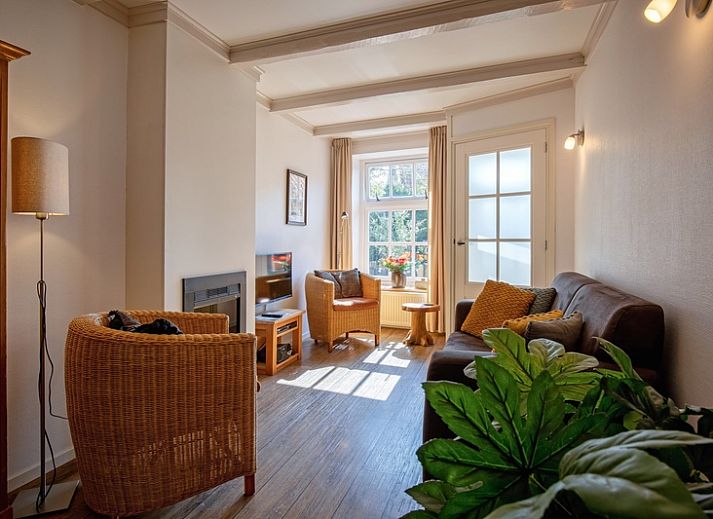 Gezellige buitenkant van Het Bakkerijtje vakantiehuis in Oudeschild, Texel met rustieke uitstraling.