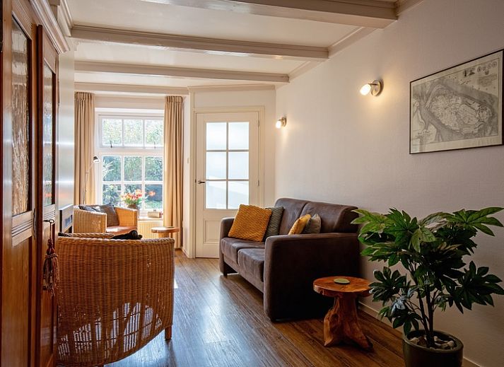 Gezellige buitenkant van Het Bakkerijtje vakantiehuis in Oudeschild, Texel met rustieke uitstraling.