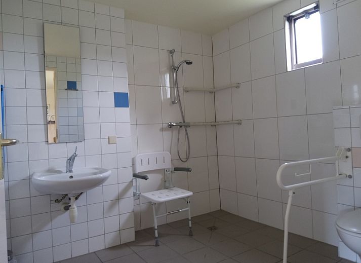 Cozy terrace at De Triaan vacation homes in South Eierland, Texel, perfect for relaxing in nature.