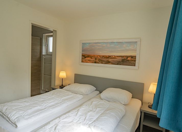 Gemuetliches Wohnzimmer des Ferienhauses de Parel 150 in De Dennen, Texel.