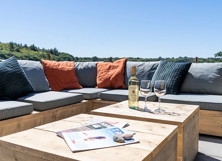 Vacation home 2 in De Dennen, Texel with modern architecture and spacious outdoor space.