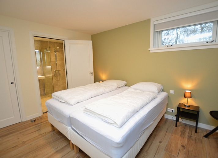 Helle und geraeumige Sitzecke im Ferienhaus De Nagtegaal 23, De Dennen, Texel, ideal zum Entspannen.