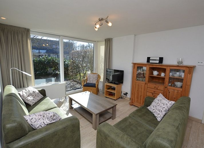 Ferienhaus de Parel 198 in De Dennen, Texel mit gruenem Garten und moderner Architektur.