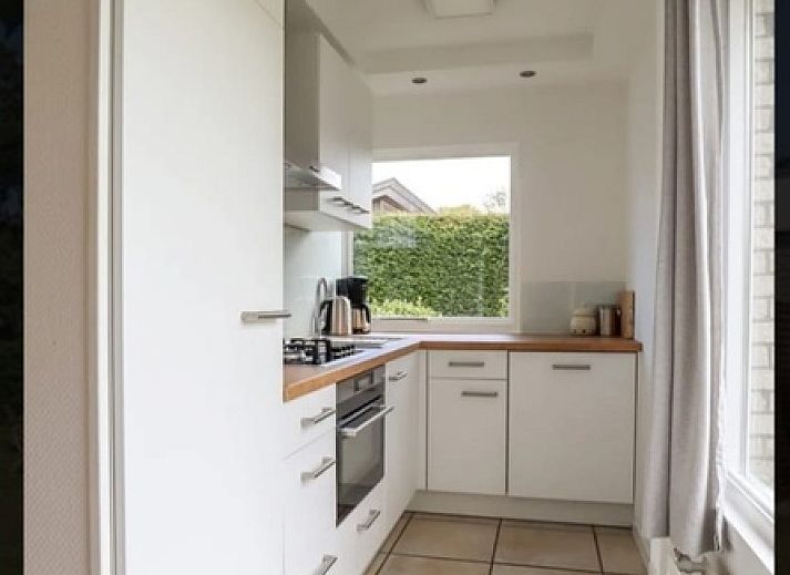 Bungalowpark 't Hoogelandt - Vakantiehuis 'Jubefe' in De Dennen, Texel met ruime tuin en terras voor ontspanning.