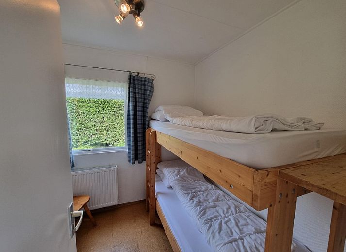 Geniet van de groene omgeving bij Bungalowpark 't Hoogelandt - Vakantiehuis 'Jubefe' in De Dennen, Texel.