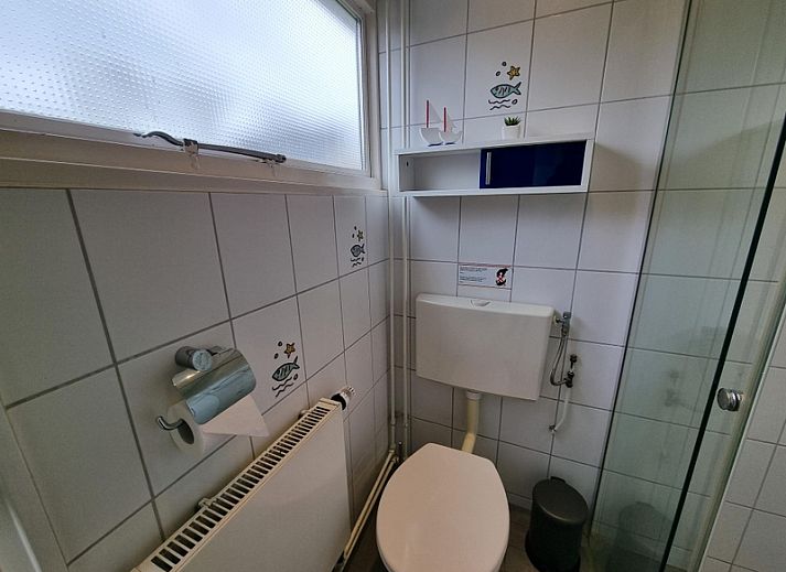 Vakantiehuis 'Jubefe' in De Dennen, Texel biedt een zonnig terras in het Bungalowpark 't Hoogelandt.