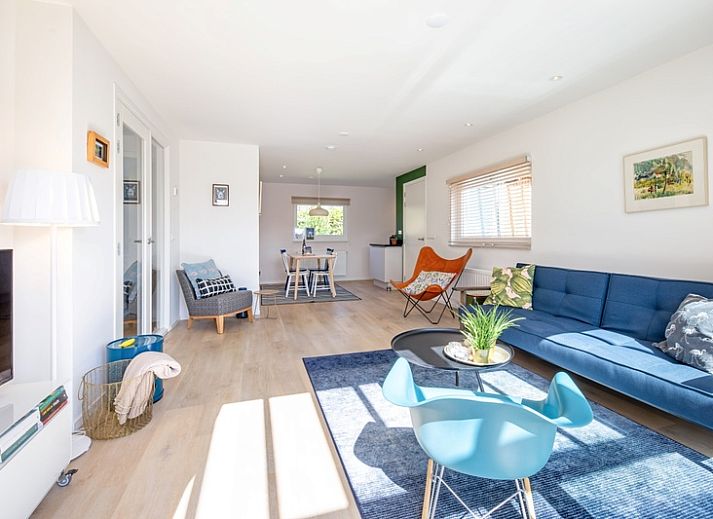 Bungalowpark Uterste Coogh - Bungalow 128 - Gerrit, terrace with green garden in De Dennen, Texel, Wadden Islands.