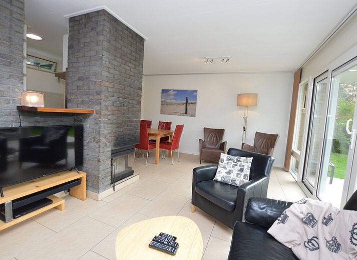 Ferienhaus Tempelierweg 24 mit Terrasse in De Dennen, Texel, umgeben von viel Gruen und Ruhe.