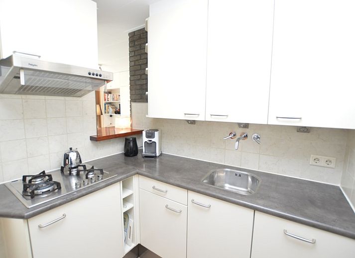 Gemuetliches Wohnzimmer mit Kamin im Ferienhaus Tempelierweg 24, De Dennen, Texel.