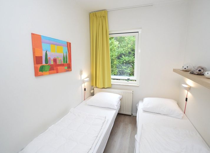 Gemuetliches Wohnzimmer mit Kamin im Ferienhaus Tempelierweg 24, De Dennen, Texel.