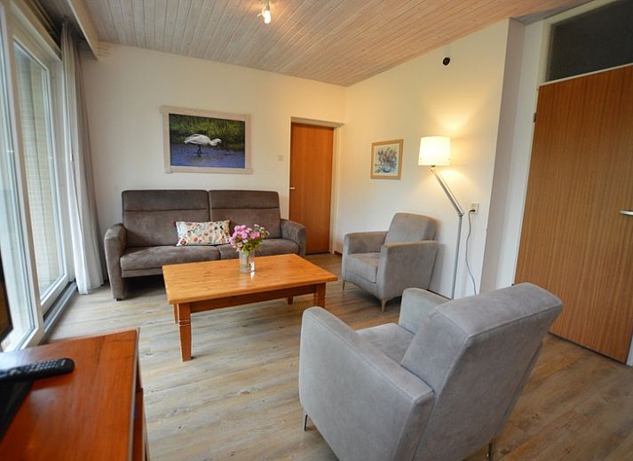 Vacation home Narcis in De Dennen, Texel with sunny terrace and green surroundings.