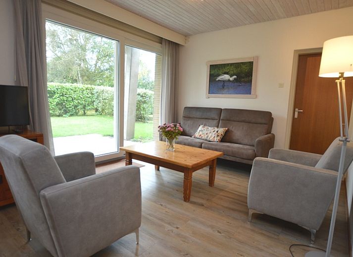 Vacation home Narcis in De Dennen, Texel with sunny terrace and green surroundings.