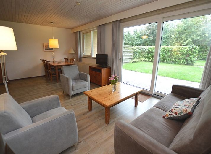 Vacation home Narcis in De Dennen, Texel with sunny terrace and green surroundings.
