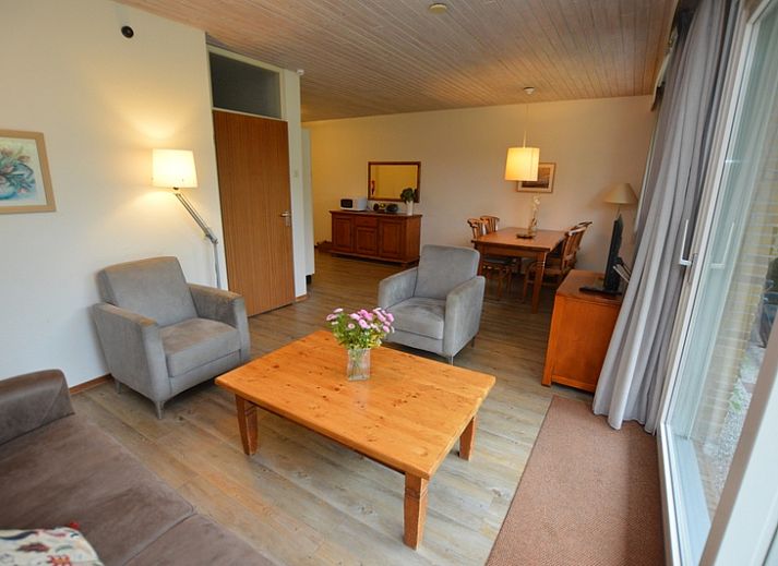 Vacation home Narcis in De Dennen, Texel with sunny terrace and green surroundings.