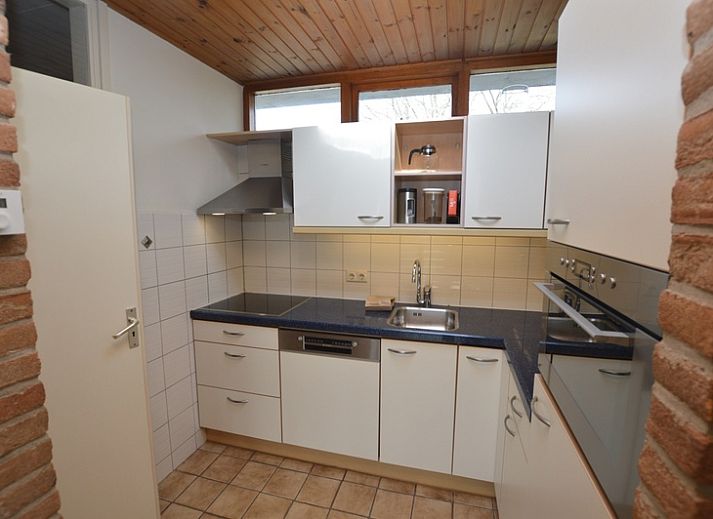 Cozy living room in Holiday home de Parel 204, De Dennen, Texel with comfortable seating area.