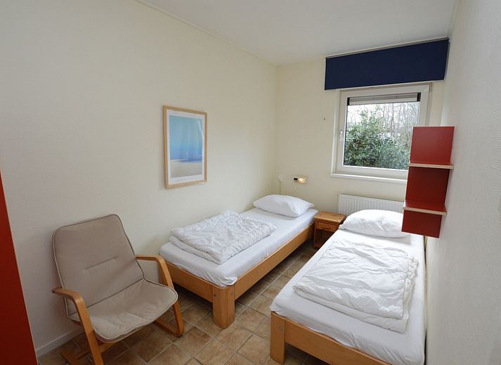 Cozy living room in Holiday home de Parel 204, De Dennen, Texel with comfortable seating area.