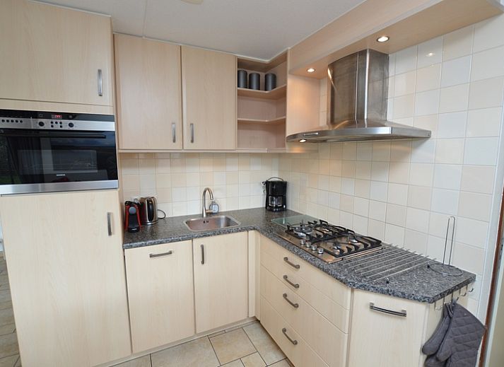 Cozy living room in vacation home Gortersmient 340, Bungalowpark Gortersmient, De Dennen, Texel.