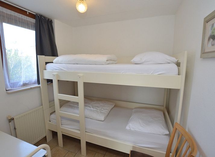 Cozy living room in vacation home Gortersmient 340, Bungalowpark Gortersmient, De Dennen, Texel.