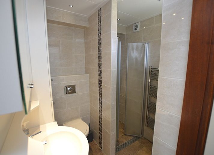 Cozy living room in vacation home Gortersmient 340, Bungalowpark Gortersmient, De Dennen, Texel.