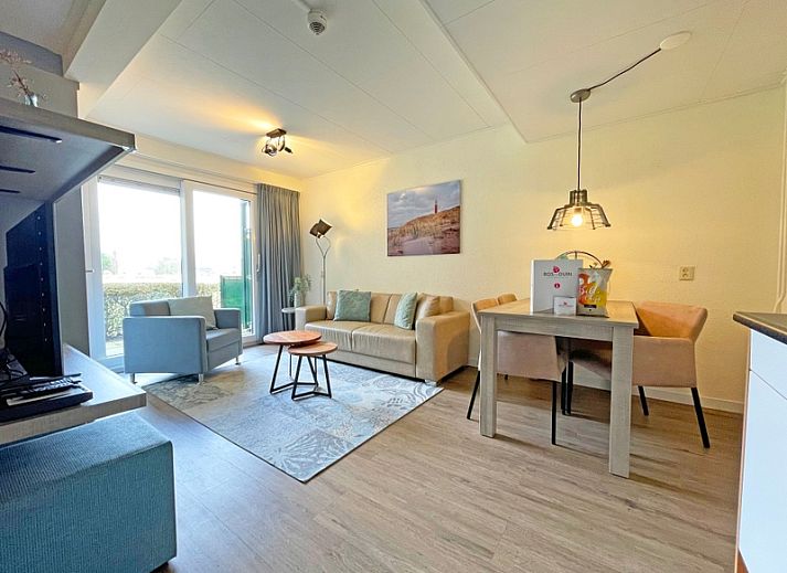 Cozy living room in Apartment Bos en Duin 14, De Dennen, Texel with comfortable seating area and natural light.