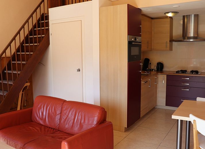 Green garden at Holiday home Gortersmient 312 in De Dennen Texel for relaxation.