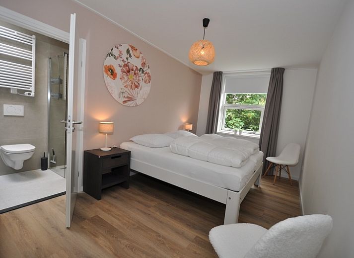 Ferienhaus Bungalow Verste Coogh 62 in De Dennen, Texel mit grosser Auffahrt und Garten.