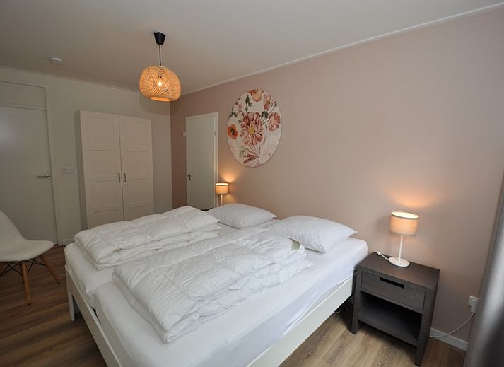 Charmantes Ferienhaus Bungalow Verste Coogh 62 in De Dennen, Texel mit Frontansicht.