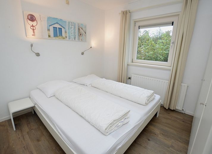 Comfortabele zithoek in Vakantiehuis de Parel 234, Texel, perfect voor ontspanning.