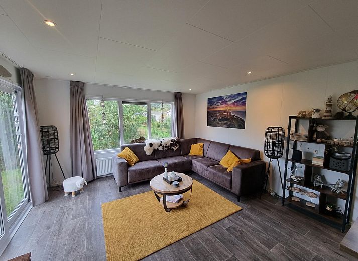 Vakantiepark de Bremakker - Weideveld 71, charmant vakantiehuis in De Dennen, Texel, omgeven door groen en rust.