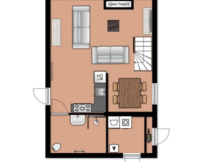 Gezellige woonkamer in vakantiehuis Gortersmient 224, Bungalowpark Gortersmient, De Dennen, Texel. Ideaal voor ontspanning op de Waddeneilanden.