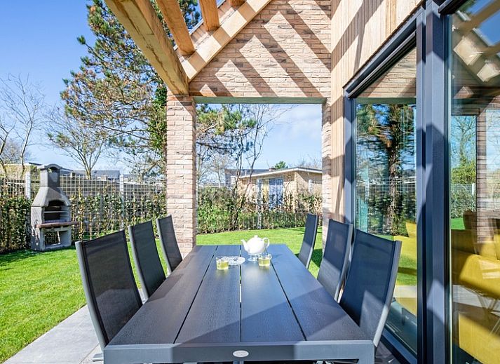 Bungalowpark 't Luwe Land - Nieuw Vredelust in De Dennen, Texel. Moderne vakantiehuis met ruim terras en groene omgeving.