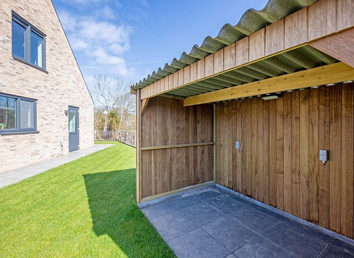 Bungalowpark 't Luwe Land - Nieuw Vredelust in De Dennen, Texel. Moderne vakantiehuis met ruim terras en groene omgeving.