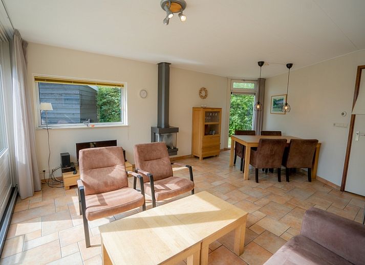 Bungalow Uterste Coogh 98 in De Dennen, Texel with spacious garden and terrace for relaxing stay.