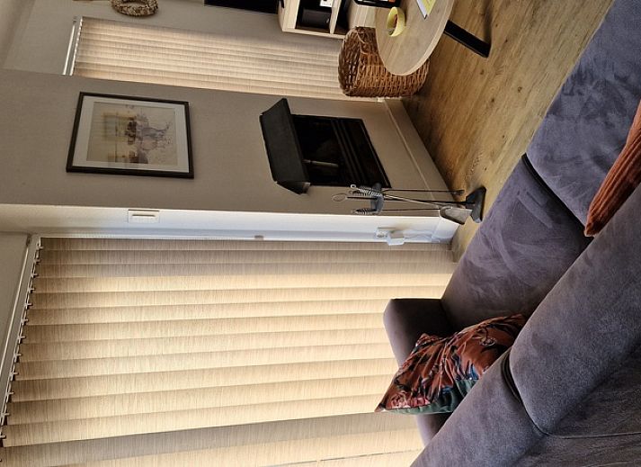 Ruim terras met buitenhaard bij vakantiehuis Gortersmient 306, De Dennen, Texel, Bungalowpark Gortersmient.