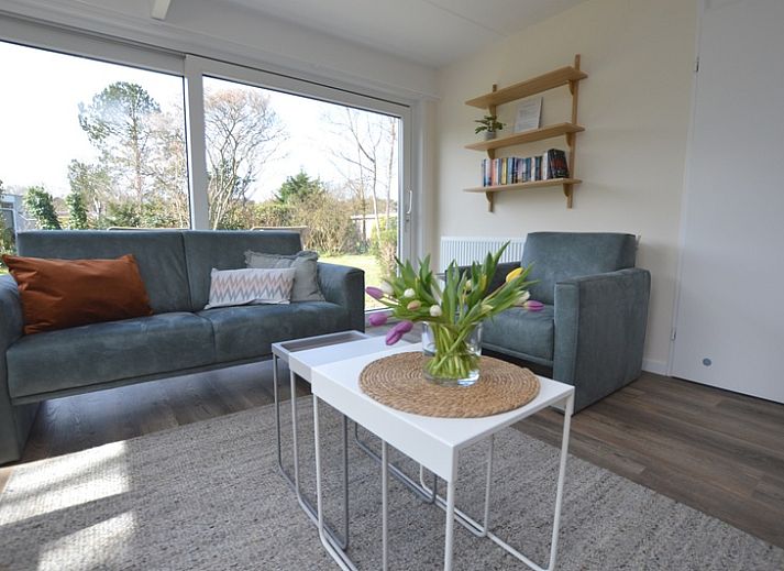 Bungalow Verste Coogh 58 in De Dennen, Texel with spacious garden and terrace for relaxation.