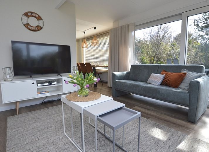 Bungalow Verste Coogh 58 in De Dennen, Texel with spacious garden and terrace for relaxation.