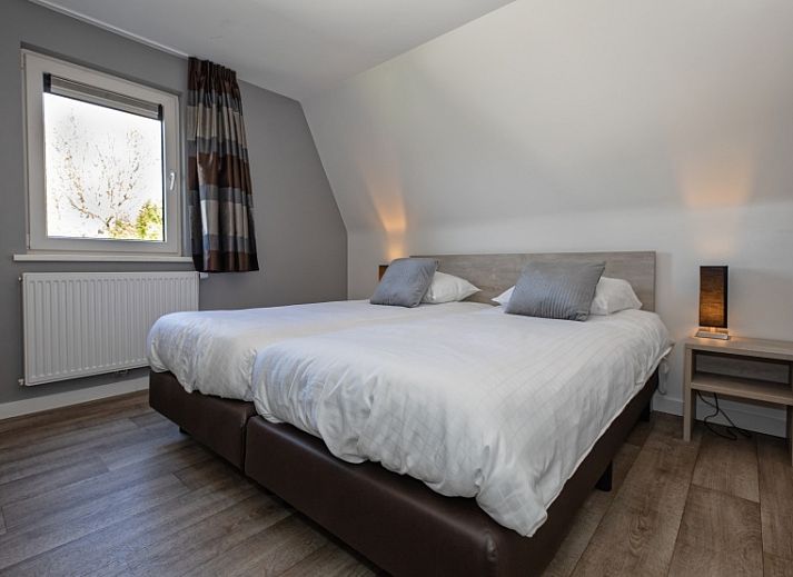 Gezellige eethoek in vakantiehuis Gortersmient 288, Bungalowpark Gortersmient, De Dennen, Texel, voor een ontspannen maaltijd.