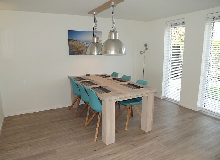 Cozy living room of Holiday home Gortersmient 350 in De Dennen, Texel, with comfortable seating area.