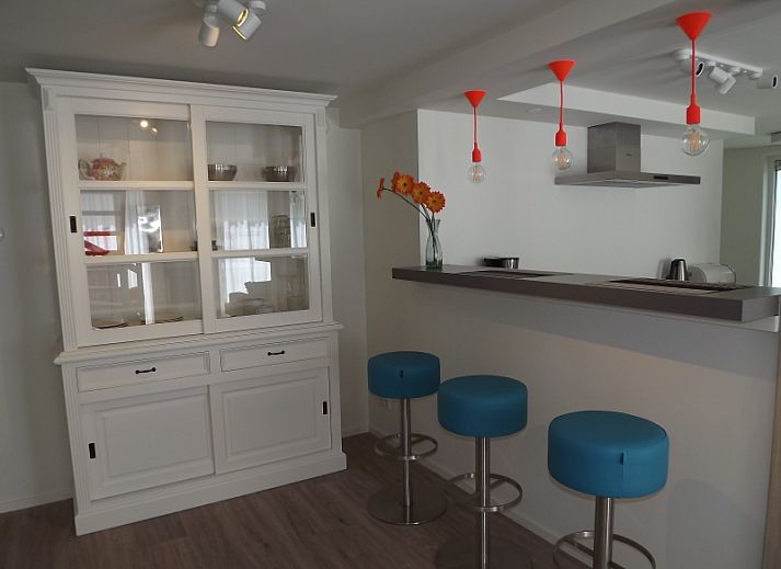 Cozy living room of Holiday home Gortersmient 350 in De Dennen, Texel, with comfortable seating area.