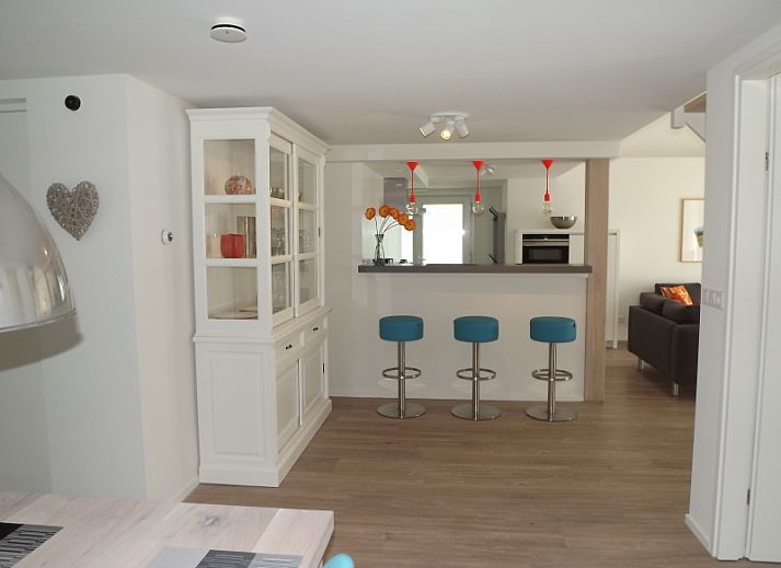 Cozy living room of Holiday home Gortersmient 350 in De Dennen, Texel, with comfortable seating area.