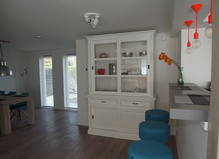 Cozy living room of Holiday home Gortersmient 350 in De Dennen, Texel, with comfortable seating area.