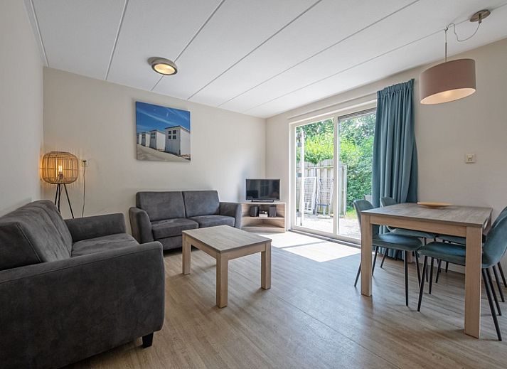 Exterior of Type 2 - 4 person vacation home in De Dennen, Texel, surrounded by greenery and tranquility.