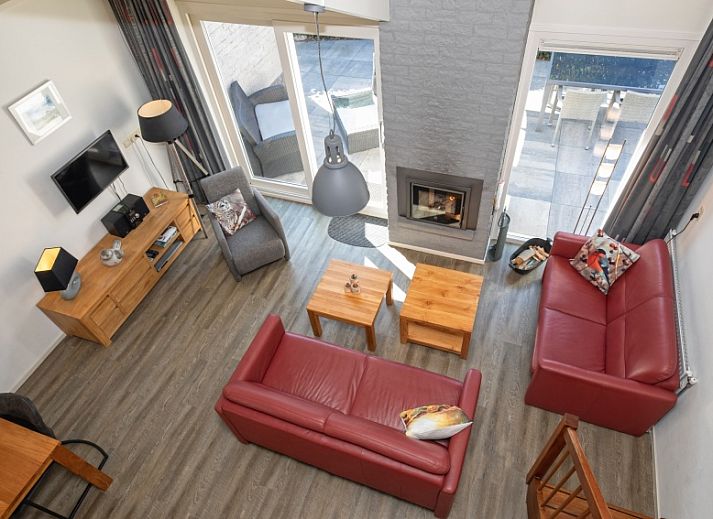 Bungalowpark Gortersmient, vakantiehuis in De Dennen, Texel met charmante gevel en tuin voor een ontspannen verblijf op de Waddeneilanden.