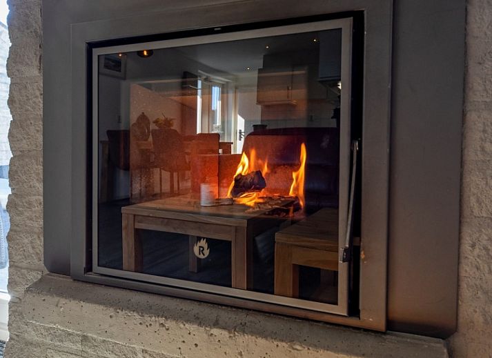 Bungalowpark Gortersmient, vakantiehuis in De Dennen, Texel met charmante gevel en tuin voor een ontspannen verblijf op de Waddeneilanden.