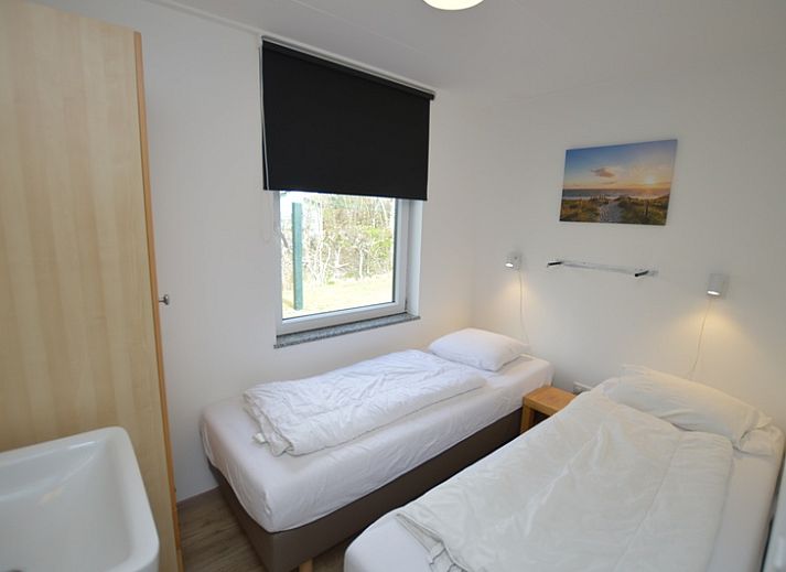Bright interior of Tempelierweg 38, vacation home in De Dennen, Texel with comfortable seating.