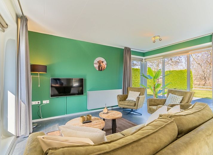 Ferienhaus Bungalow 90a im Bungalowpark 't Hoogelandt, Texel, mit Aussenbereich und Blick ins Gruene.