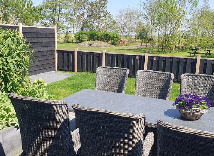 Helianthus vacation home in De Dennen, Texel with spacious garden and balcony.
