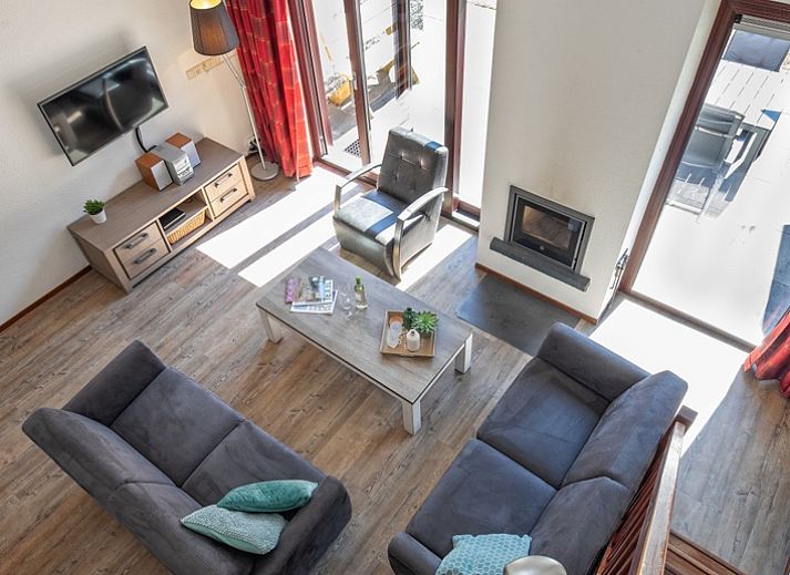 Buitenzijde van Vakantiehuis Gortersmient 328, De Dennen, Texel met ruime tuin en terras.